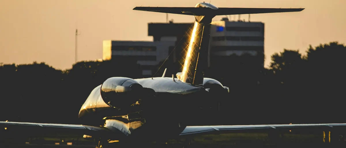 Business jet on the ramp at night