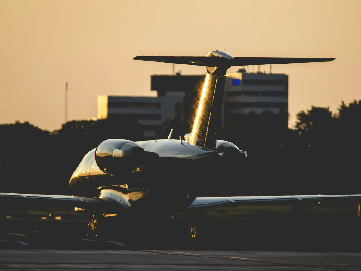 Business jet on the ramp at night